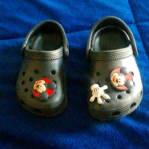 Toddler size 6 crocs with Mickey Mouse charms